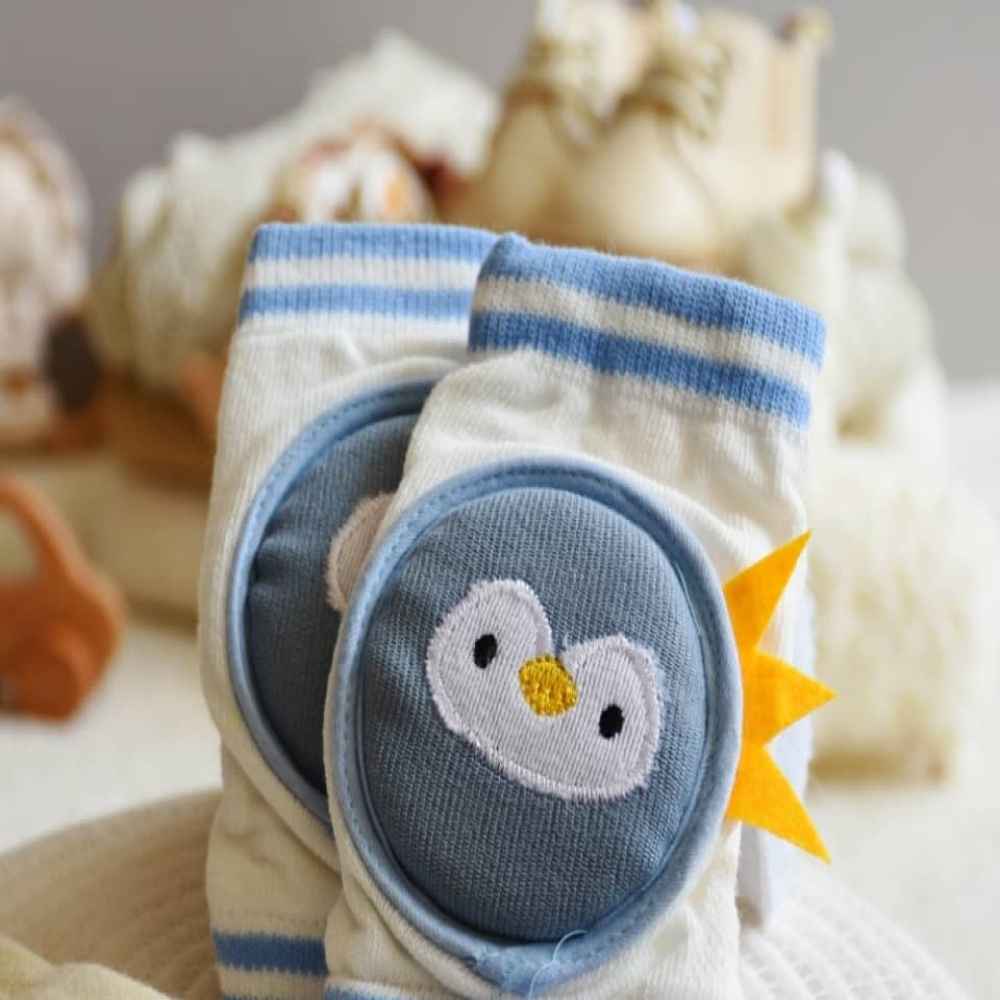 Knee- braces- for -babies- and -children with- blue -penguin-design_11zon زانوبند سبز طرح پنگوئن - تصویر 1